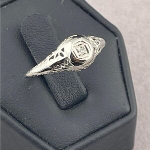 Angels & Diamonds Silver Ring with Intricate Design